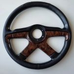 BBS Four spoke steering wheel with “briar wood” insert.